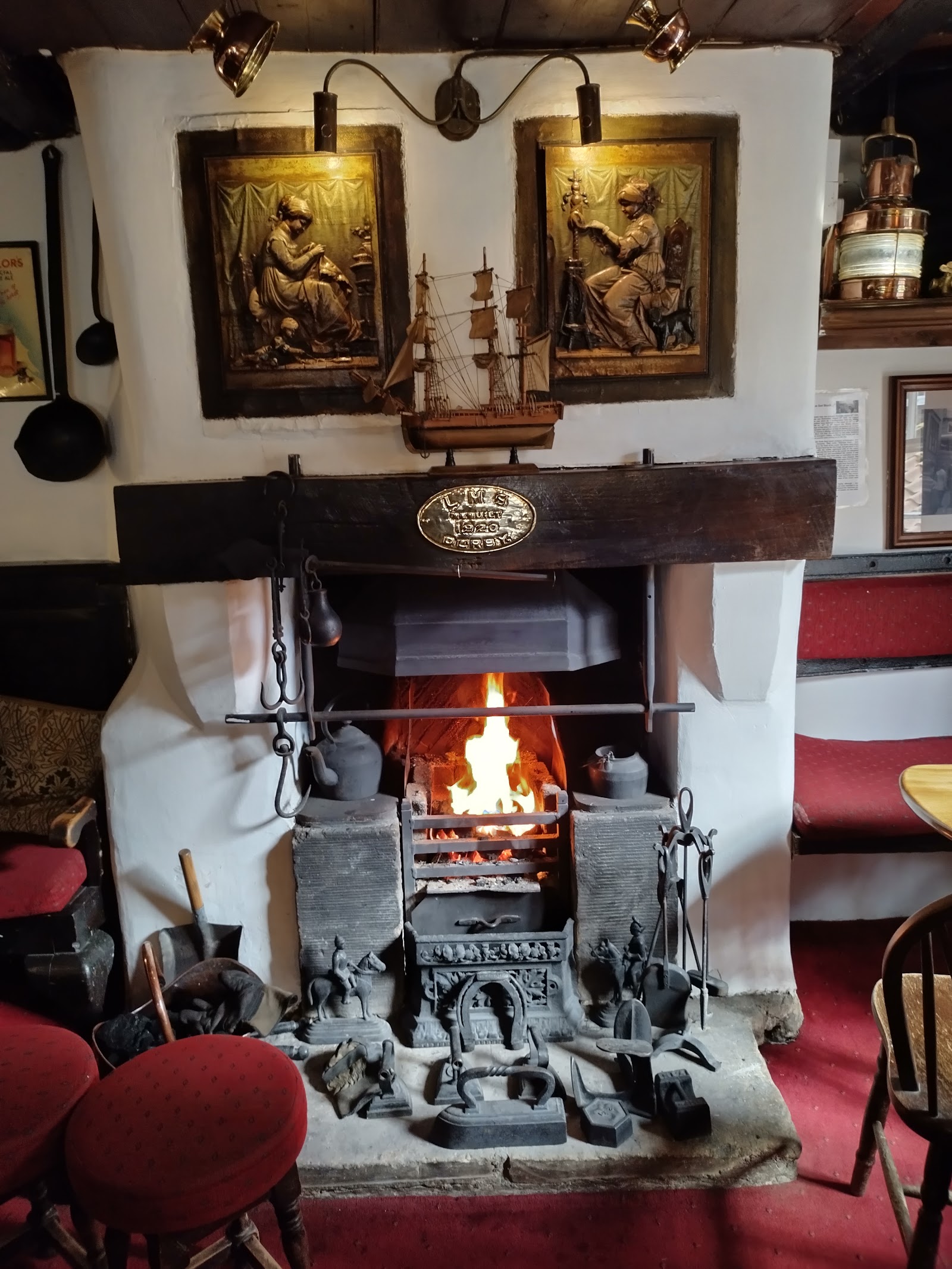 The cast-iron fireplace at The Laurel Inn